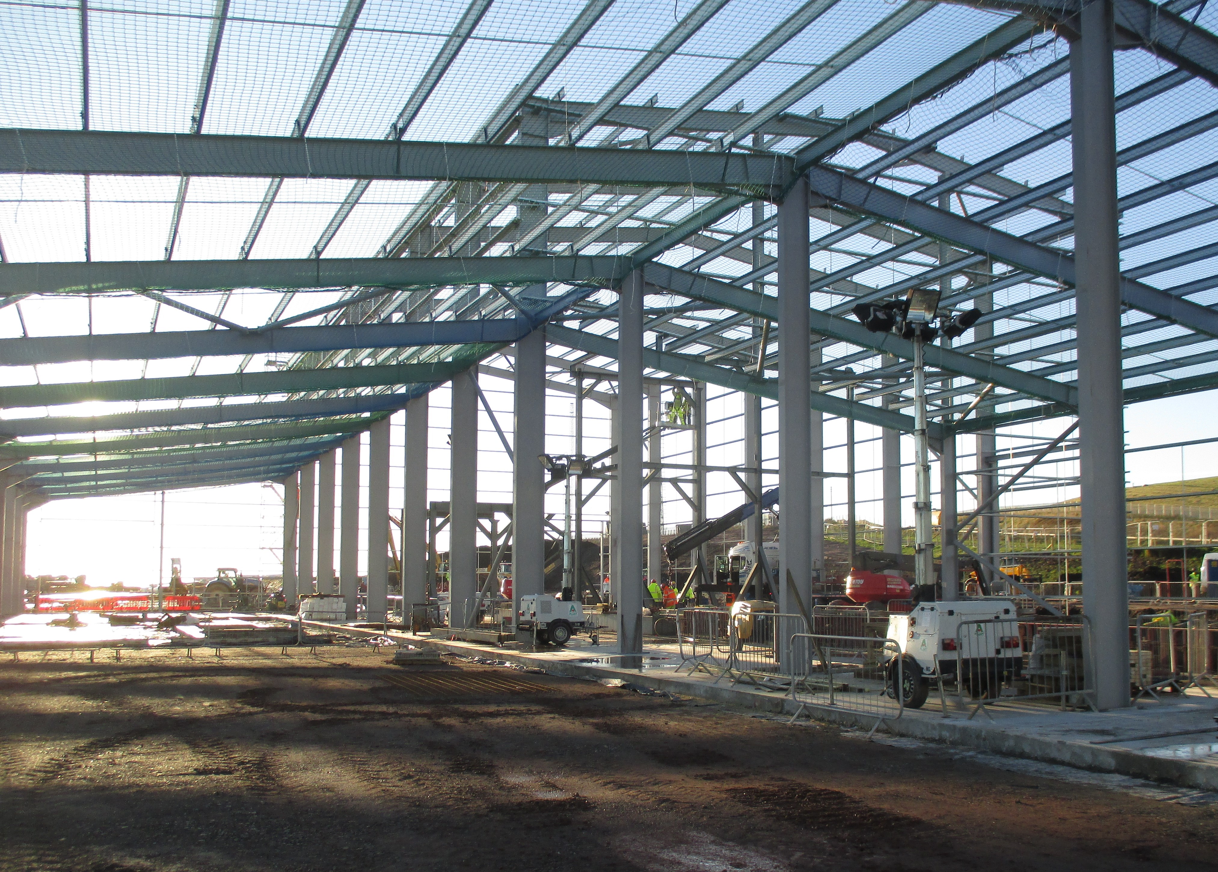 Steel portal frame under construction on a commercial development